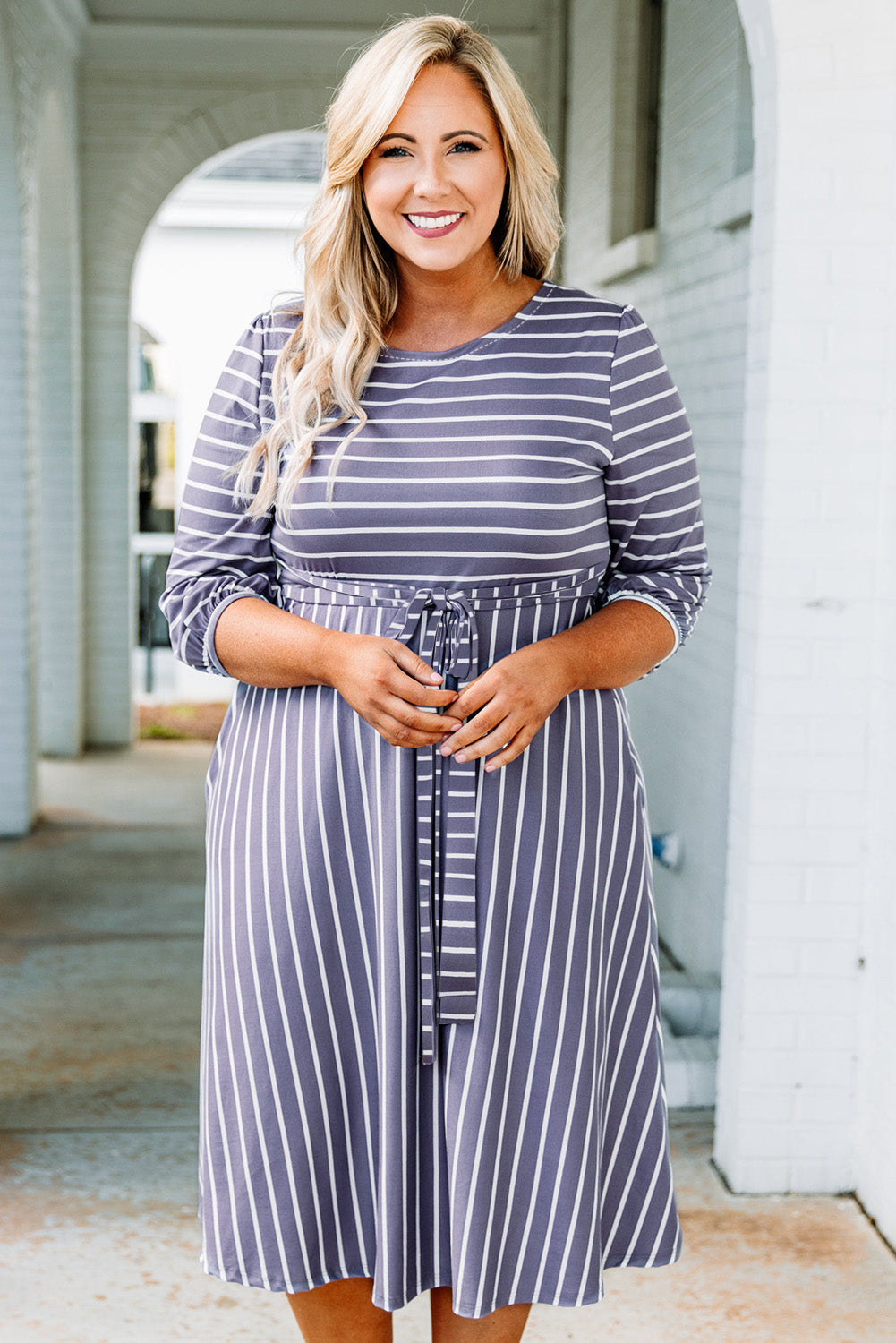 Chic gray striped plus size dress with tie waist and 3/4 sleeves