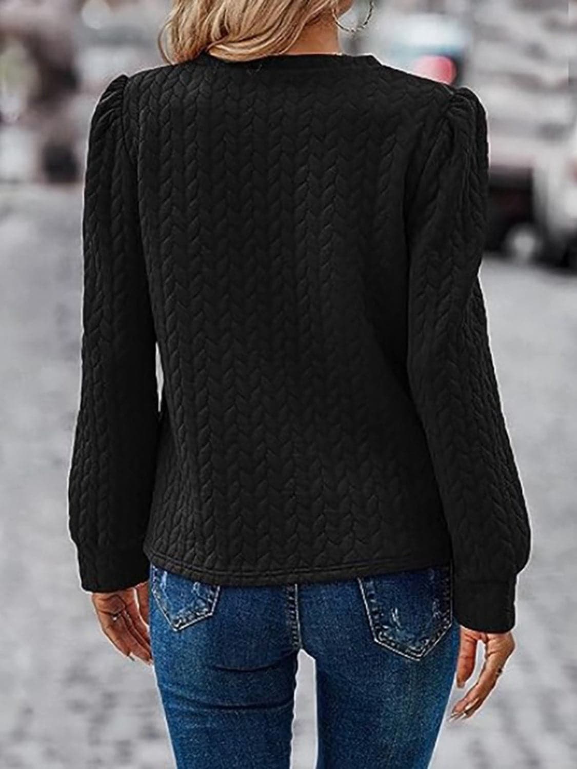 Textured Round Neck Long Sleeve Sweatshirt.