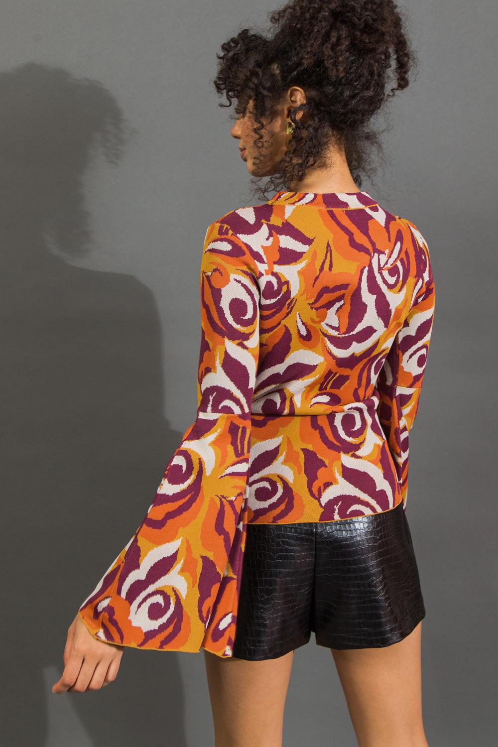 Detail shot of the soft, intricate knit texture on the Flying Tomato HER FAVORITE FEATURES SWEATER TOP, showcasing its qualit