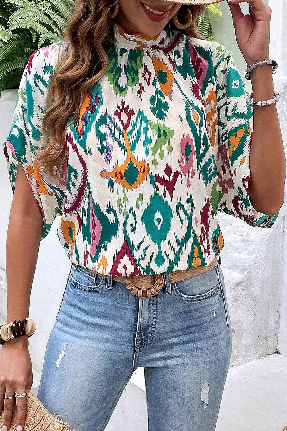 Printed Mock Neck Half Sleeve Blouse.