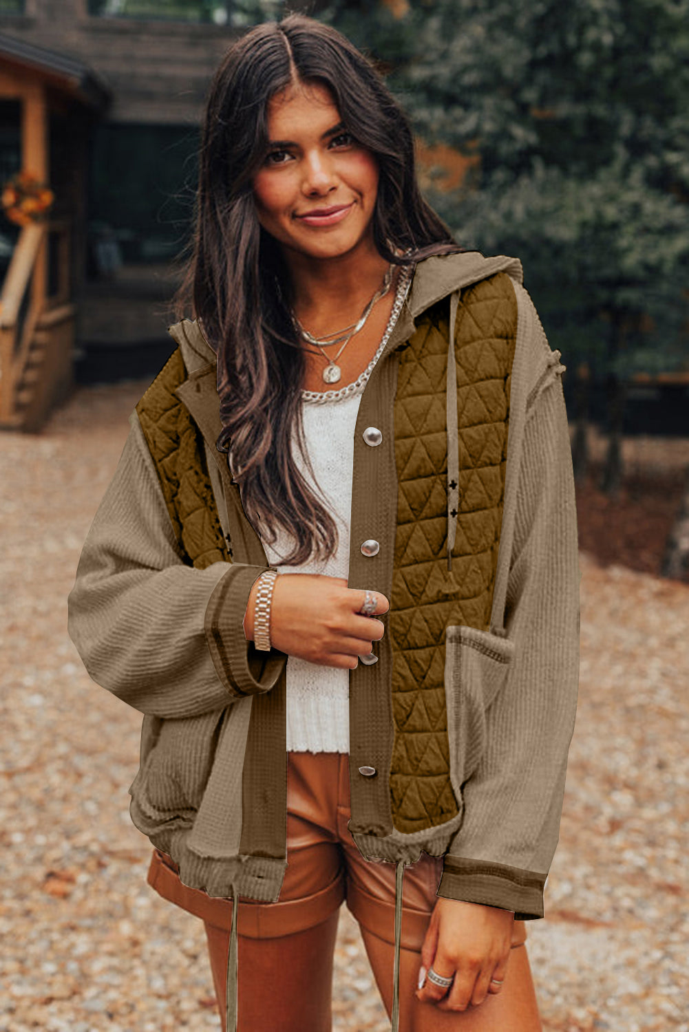 Cozy jungle green quilted hooded jacket with a stylish patchwork design