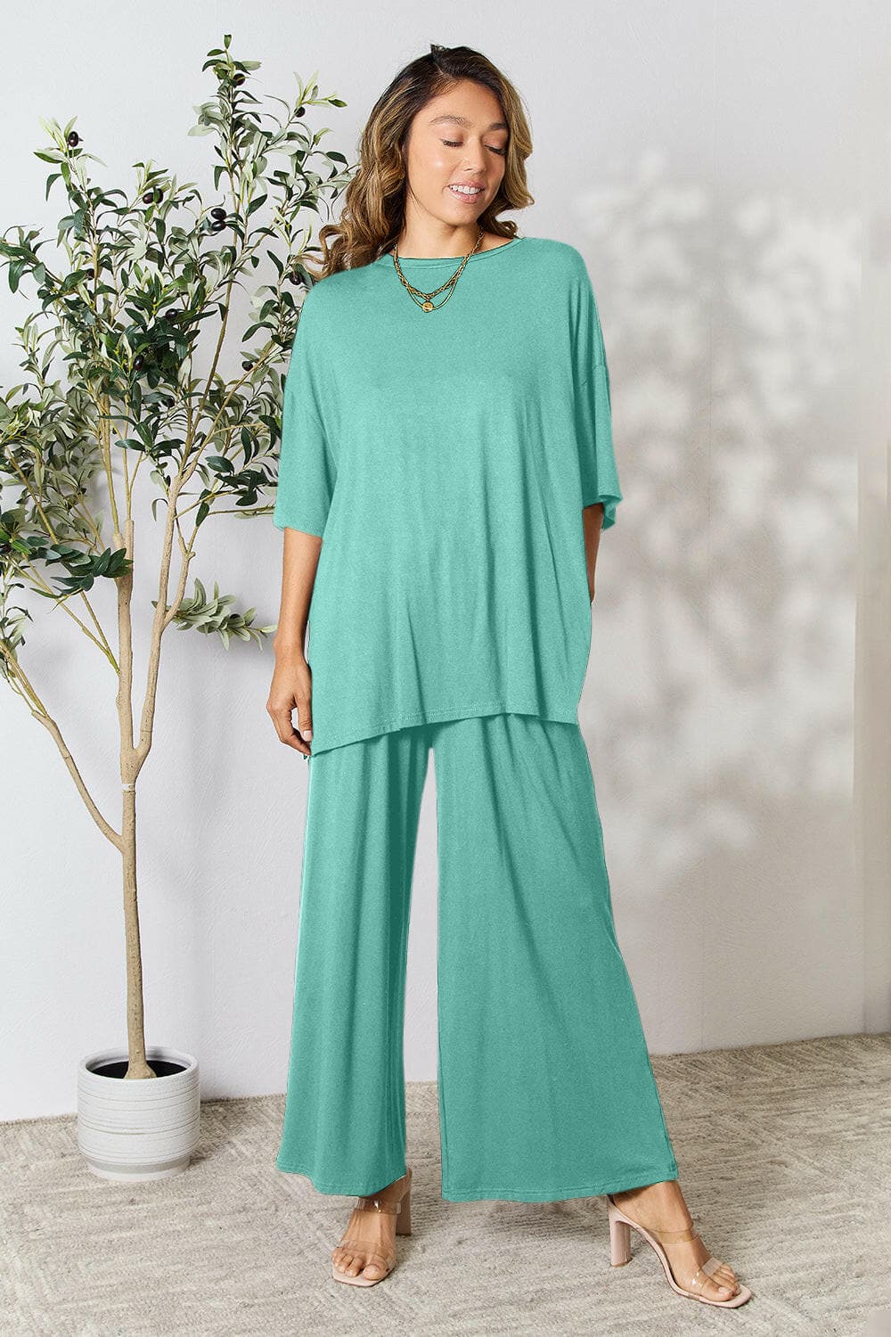 Double Take Full Size Round Neck Slit Top and Pants SetUpgrade Your Style with the Double Take Set
 Step into sophistication with our Double Take Full Size Round Neck Slit Top and Pants Set. This chic and versatile two-pLove Salve Full Size Round Neck Slit Topusa