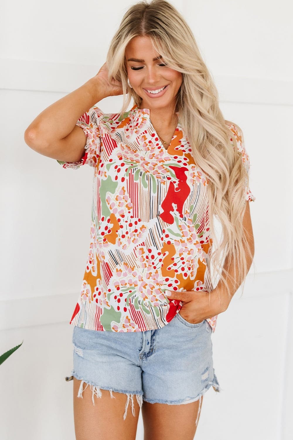 Printed Notched Short Sleeve Blouse.