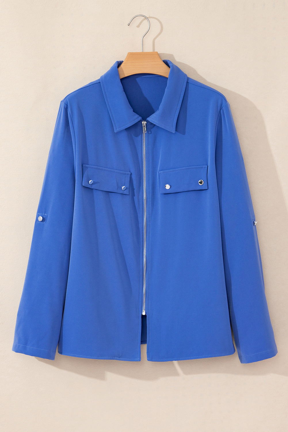 Dusk Blue Zip-Up Jacket with Tab Sleeves and Flap Detail