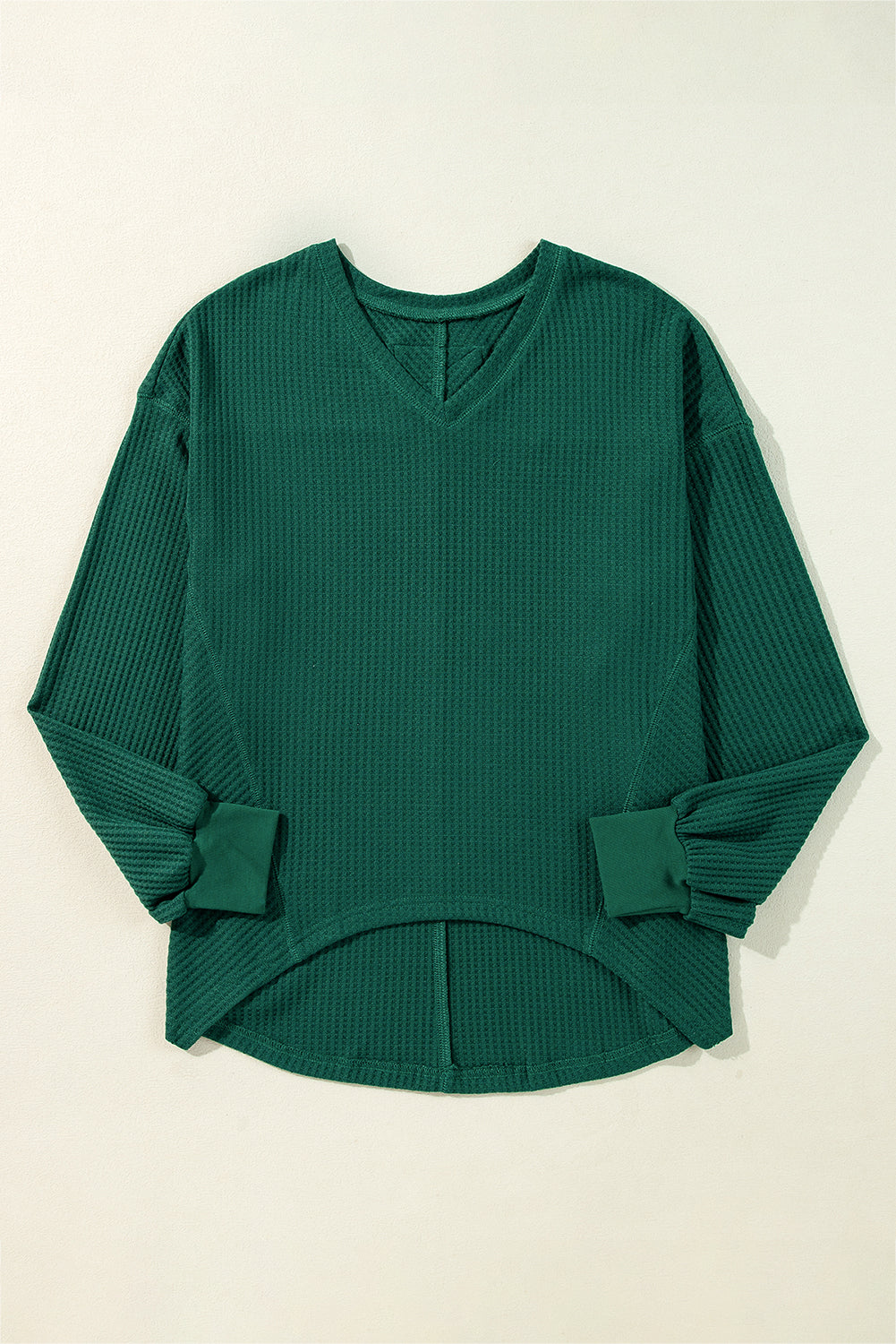 Chic blackish green waffle knit V-neck long sleeve blouse with drop shoulders