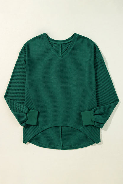 Chic blackish green waffle knit V-neck long sleeve blouse with drop shoulders