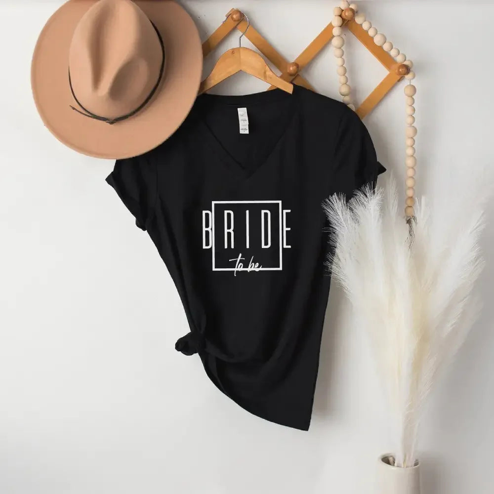 Model wearing the Adorb.co Bride To Be V-neck T-shirt, showing its comfortable and flattering fit for a wedding shower.