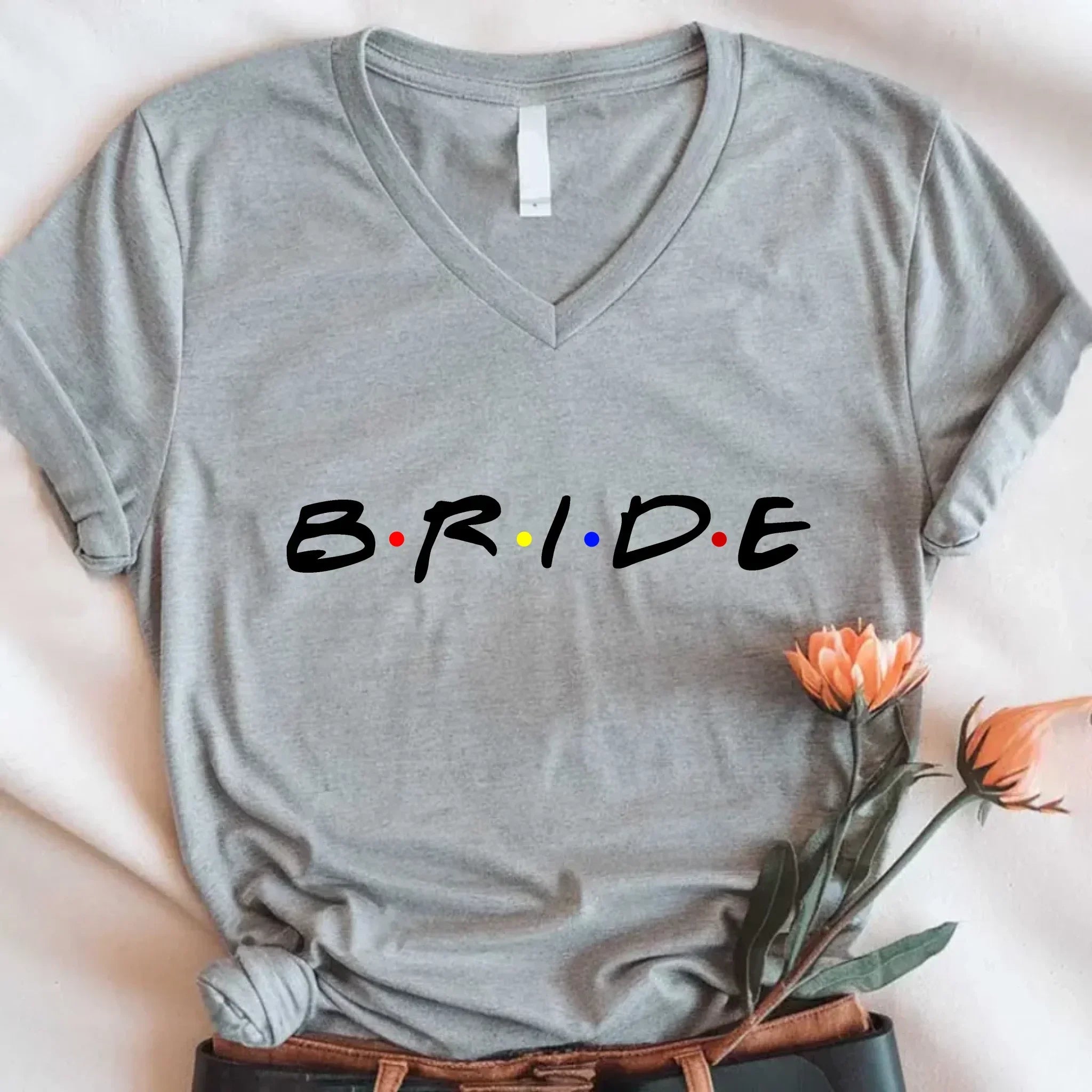 Adorb.co Bride V-Neck Tee worn during a joyful celebration, allowing comfortable movement for memorable moments.