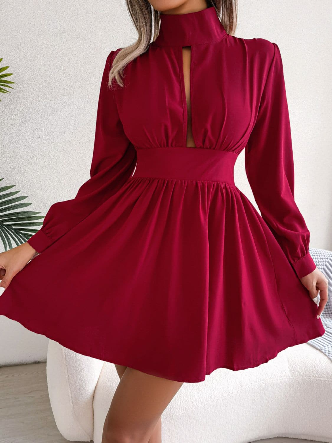 Cutout Turtleneck A-Line Mini Dress.