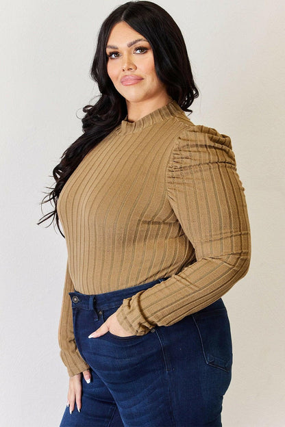 Ribbed Elegance Mock Neck Top with Puff SleevesDiscover Effortless Elegance
 Embrace sophistication with our Ribbed Elegance Mock Neck Top with Puff Sleeves. This top is designed to elevate your everyday wardrobeLove Salve Ribbed Elegance Mock Neck TopTIKTOK