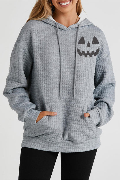 Autumn vibes pumpkin face graphic hoodie with pocket