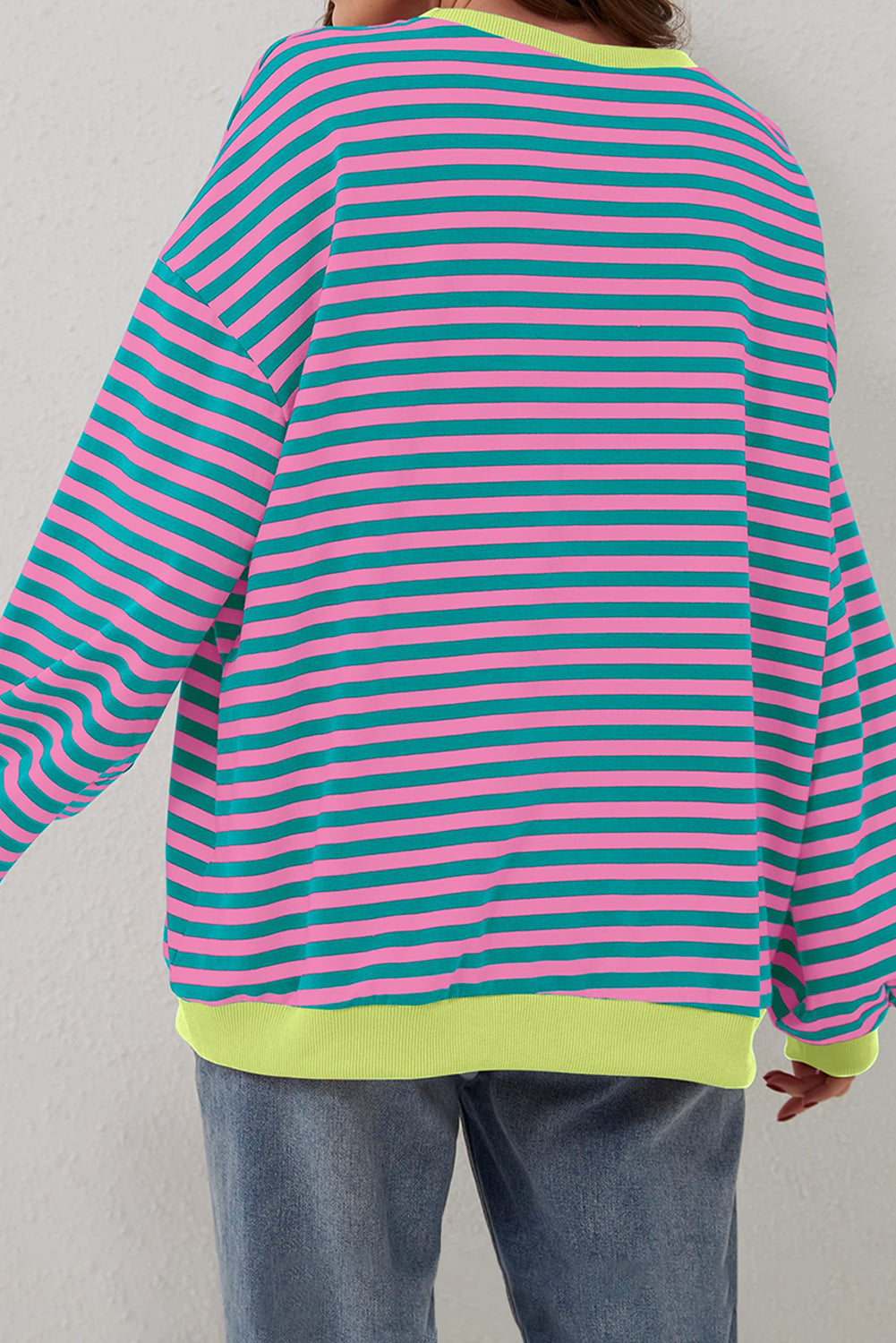 Trendy oversized green striped pullover