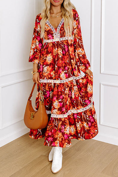 Elegant orange floral maxi dress with lace trim and V-neckline