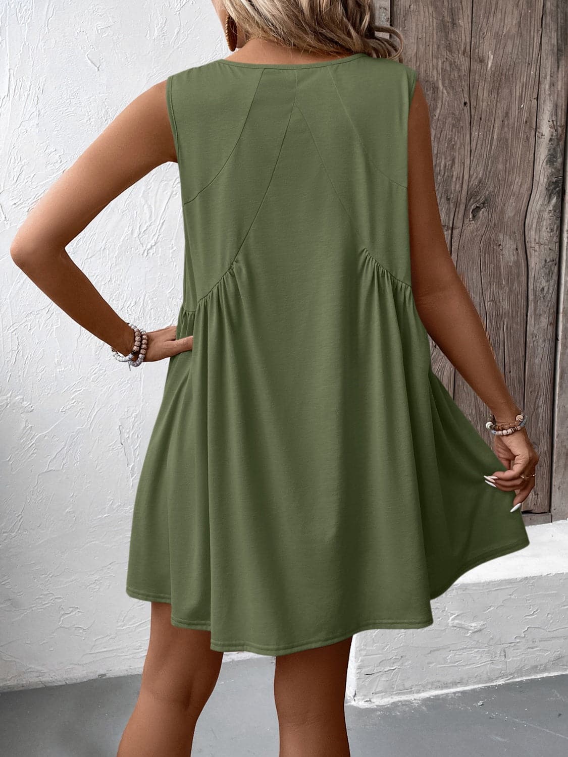 Ruched V-Neck Sleeveless Mini Dress.