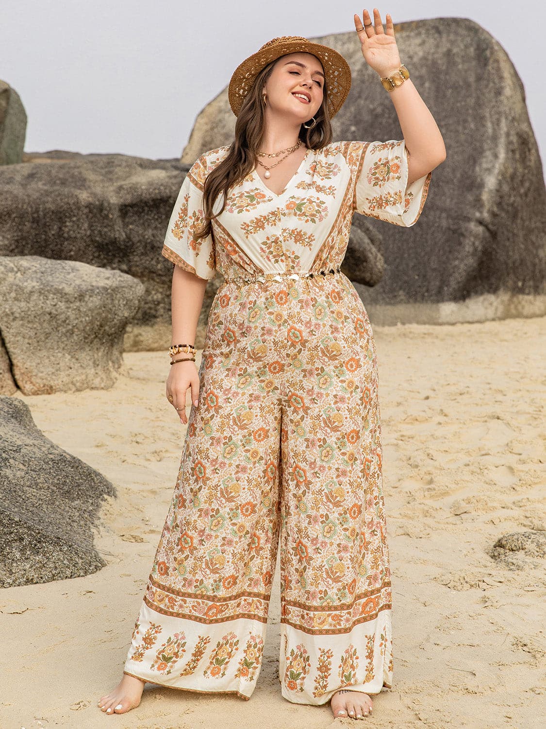 Plus Size V-Neck Flutter Sleeve Wide Leg Jumpsuit.