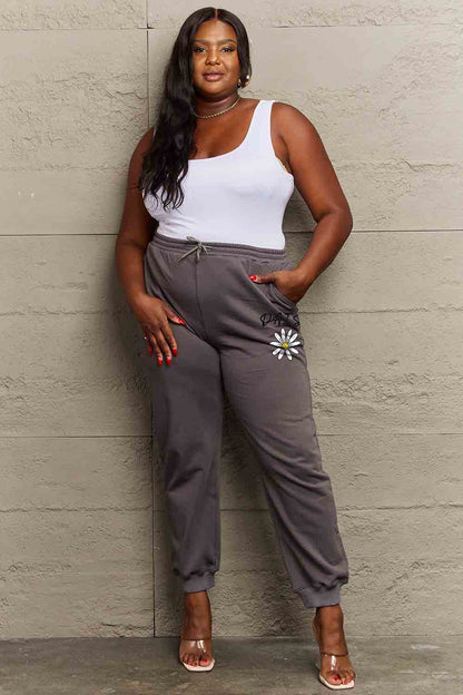 Simply Love Simply Love Full Size Drawstring DAISY Graphic Long Sweatpants.