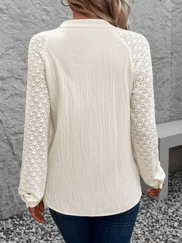 Textured Notched Long Sleeve Shirt.