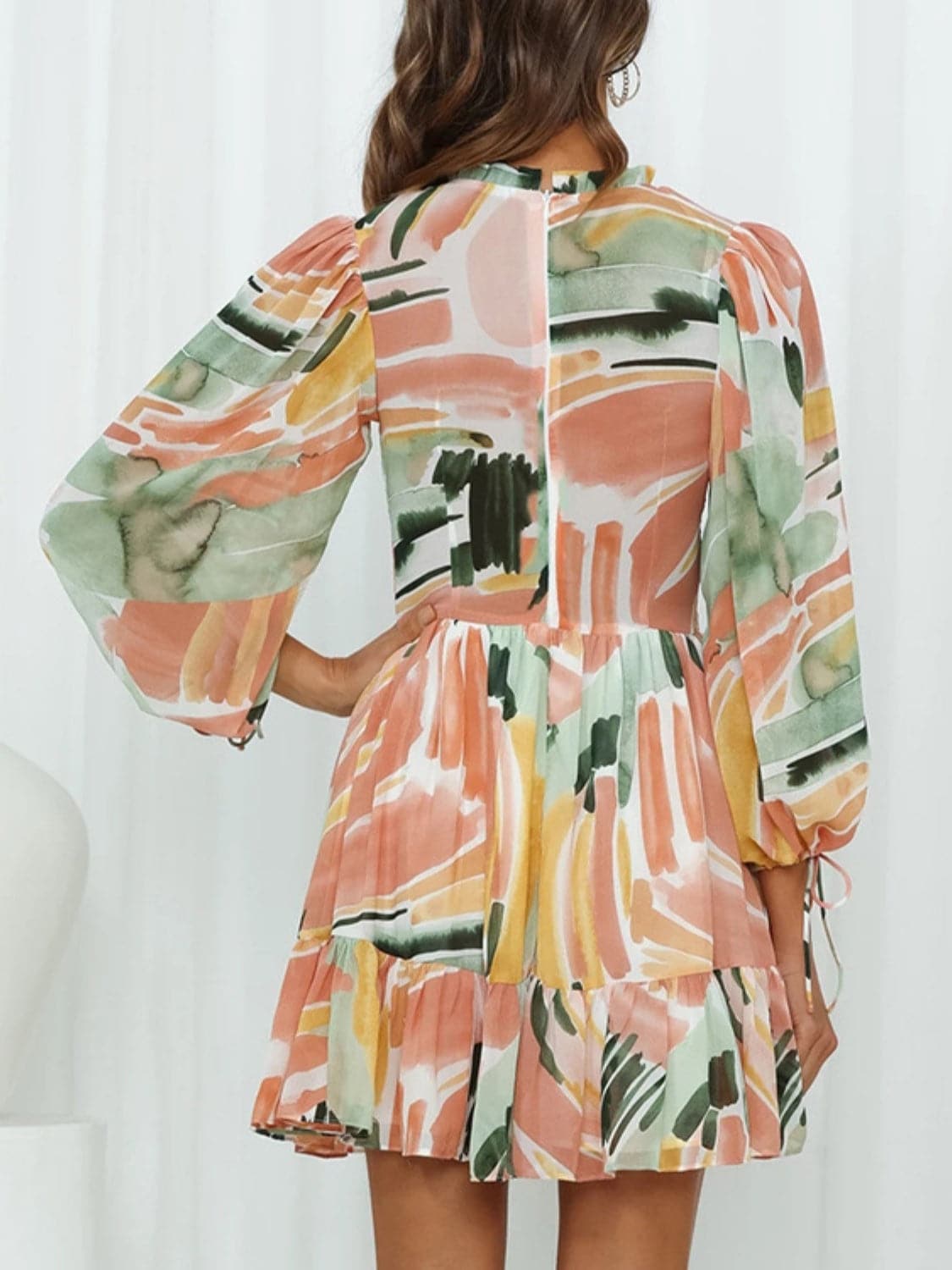 Printed Mock Neck Balloon Sleeve Mini Dress.