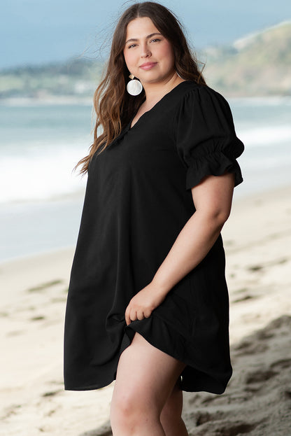 Elegant black ruffled mini dress with puff sleeves for plus sizes