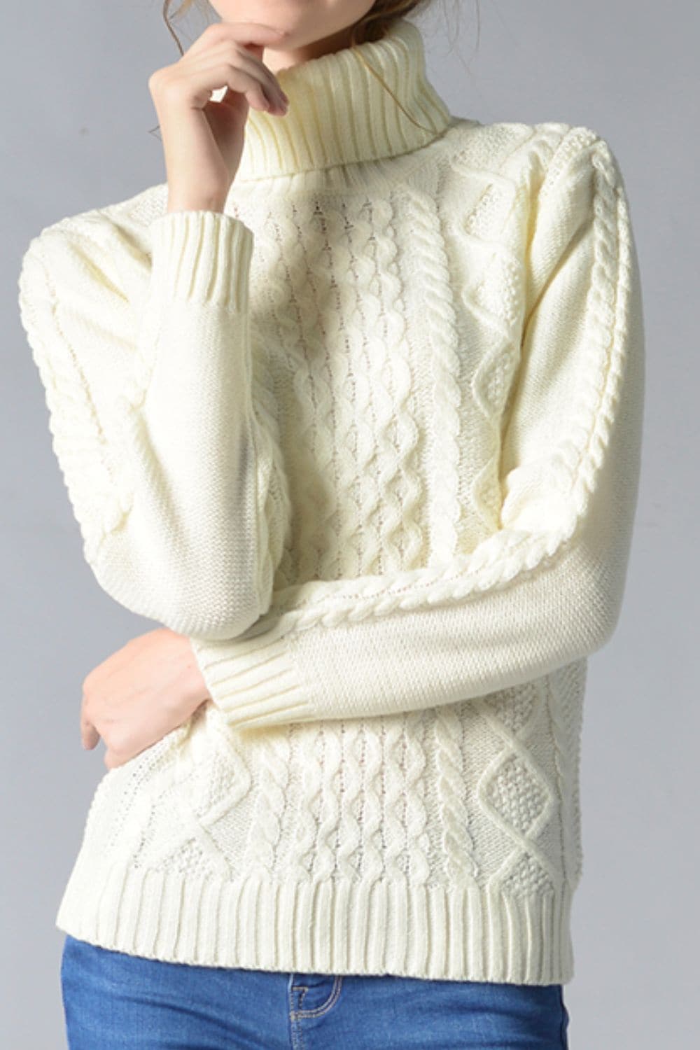 Cable-Knit Turtleneck Pullover Sweater.