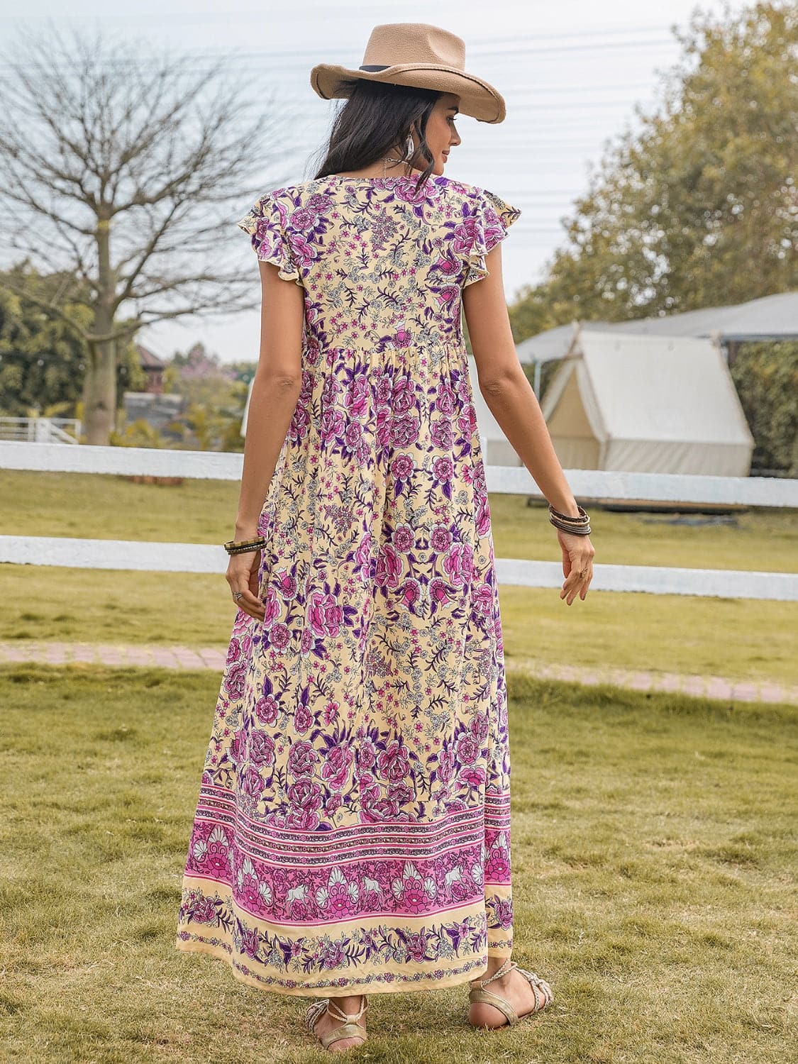 Ruffled Printed Tie Neck Cap Sleeve Dress.