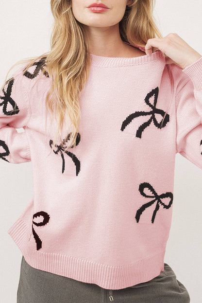 Light Pink Bow Print Cozy Knit Sweater with cute bow design and round neckline.