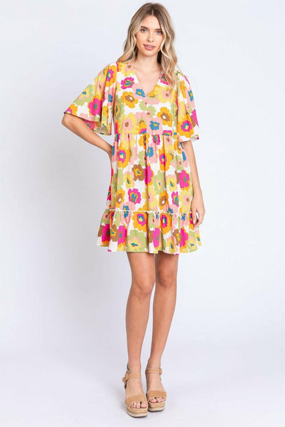 GeeGee Full Size Floral V-Neck Ruffle Trim Mini DressDiscover the GeeGee Full Size Floral V-Neck Ruffle Trim Mini Dress
 Step into a world of charm and elegance with the GeeGee Full Size Floral V-Neck Ruffle Trim Mini Love Salve -Neck Ruffle Trim Mini Dressusa