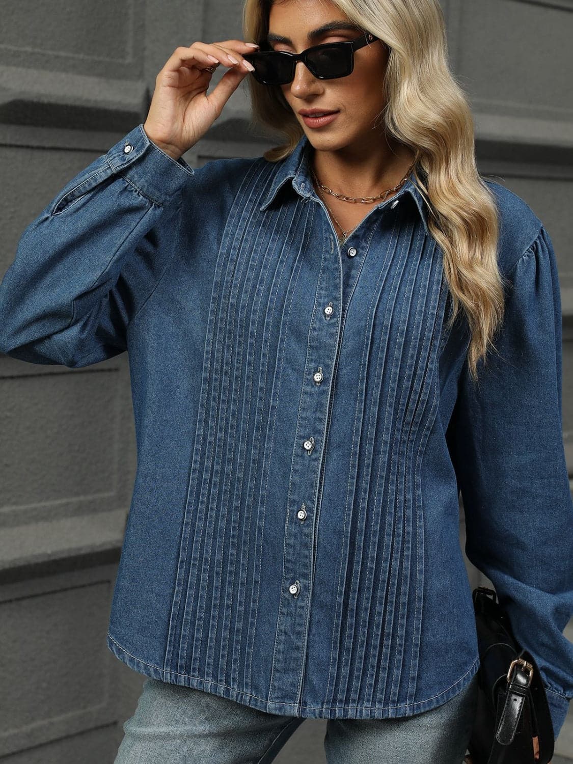 Classic button-down denim shirt with collar and long sleeves