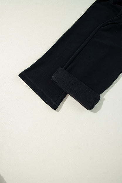 Cozy black fleece-lined casual pants with adjustable drawstring waist