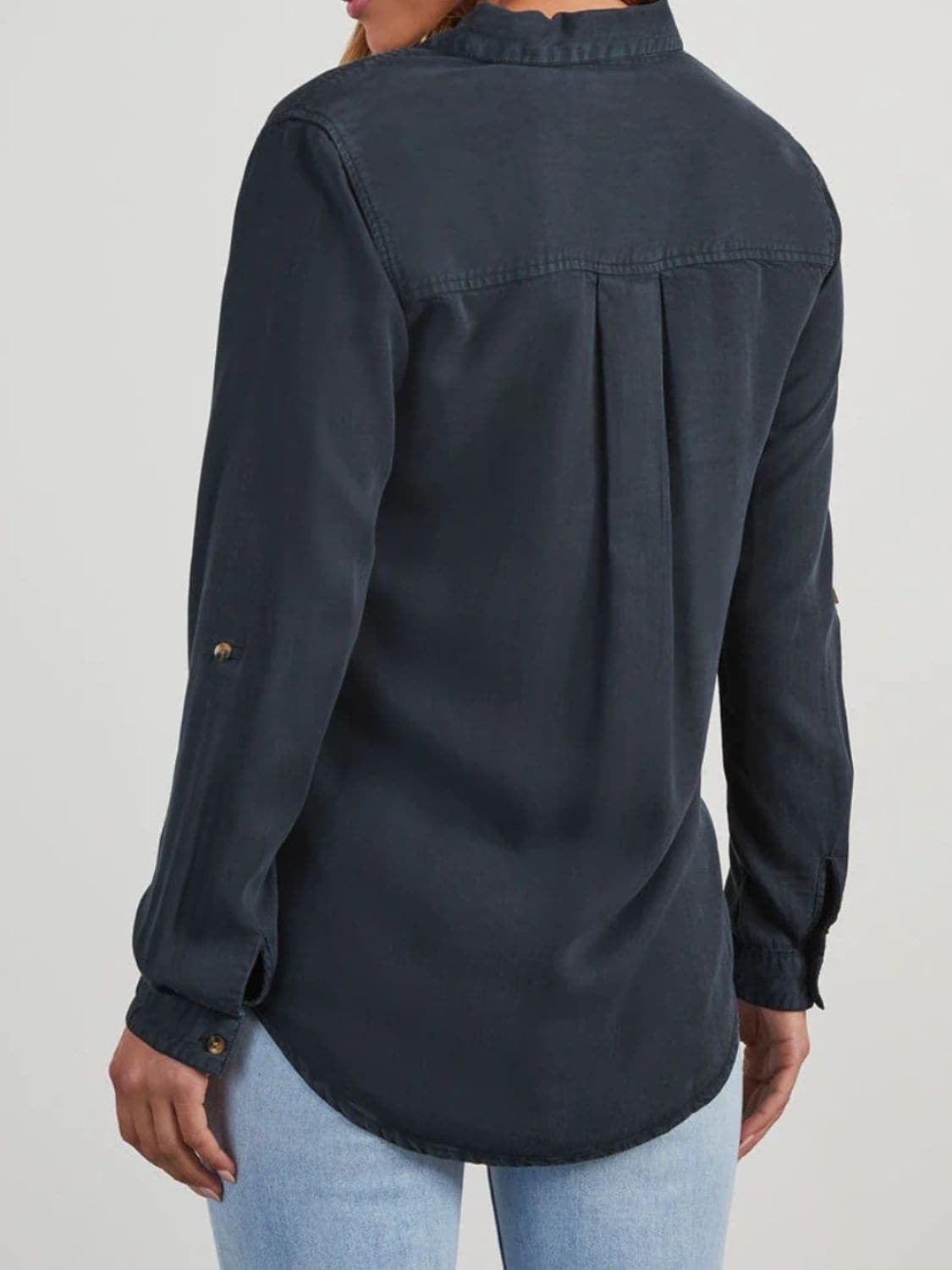 Chic collared denim top with roll-tab sleeves