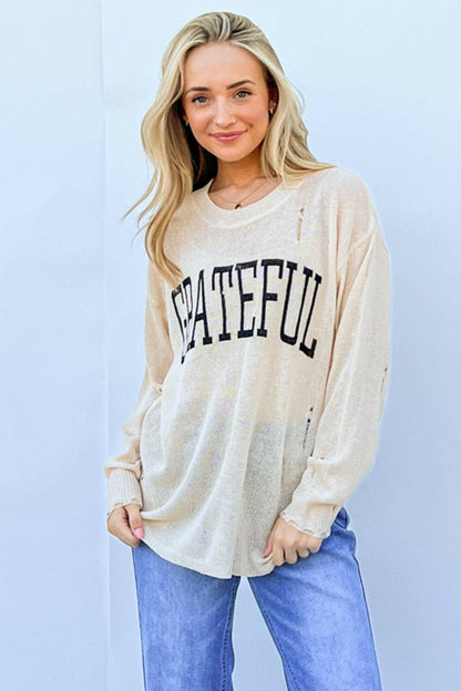 And The Why GRATEFUL Long Sleeve Knit TopStay Chic and Cozy with the GRATEFUL Long Sleeve Knit Top
 The GRATEFUL Long Sleeve Knit Top is your perfect companion for effortless style this season. Crafted fromLove Salve GRATEFUL Long Sleeve Knit Topjust arrived