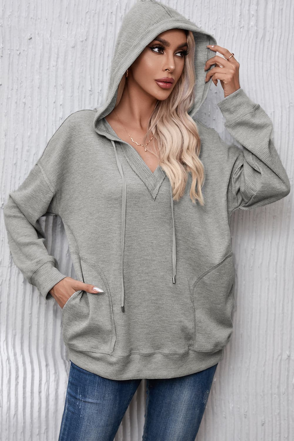 Drawstring Pocketed Dropped Shoulder Hoodie.