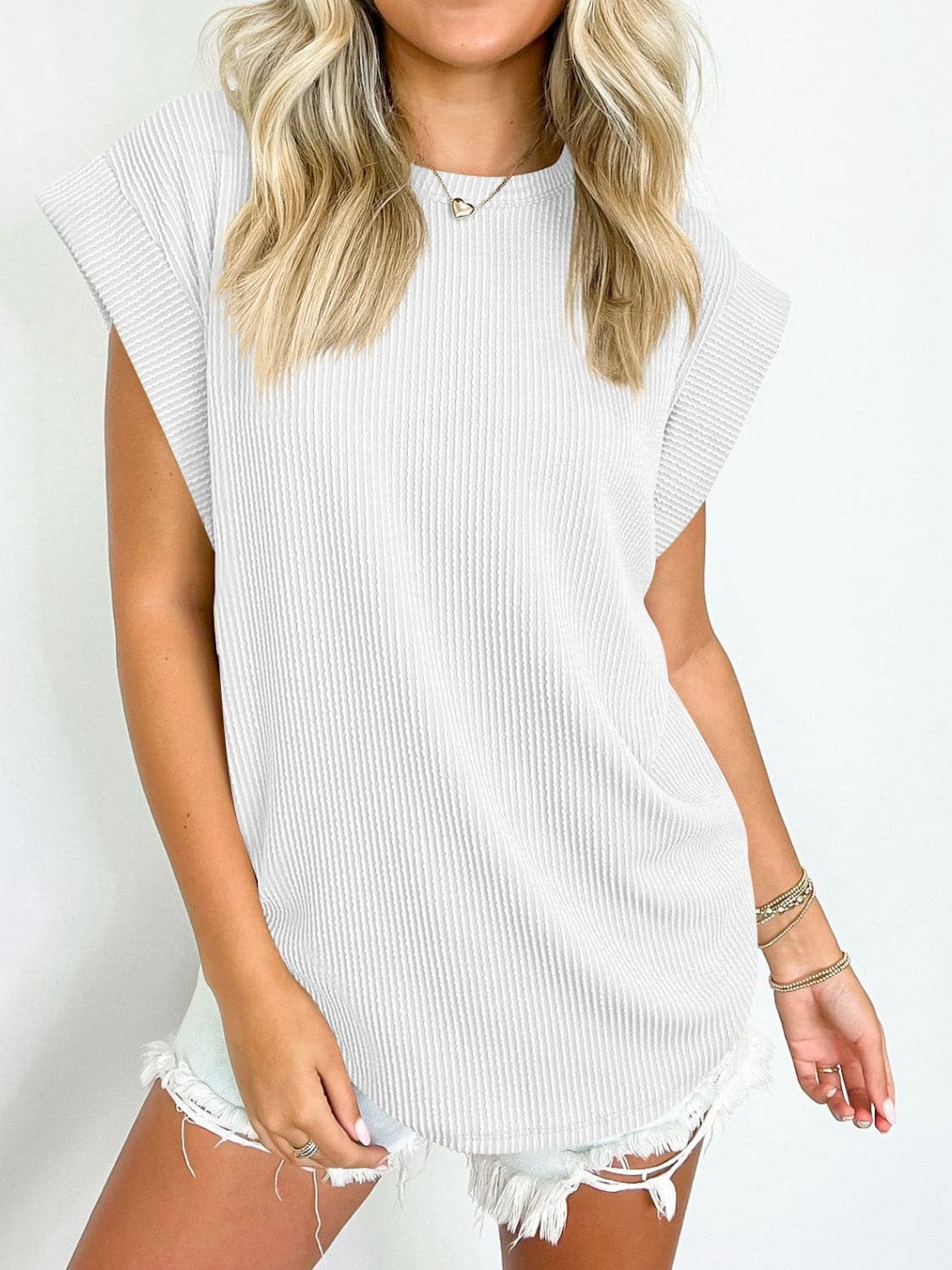 Textured Round Neck Cap Sleeve Blouse.