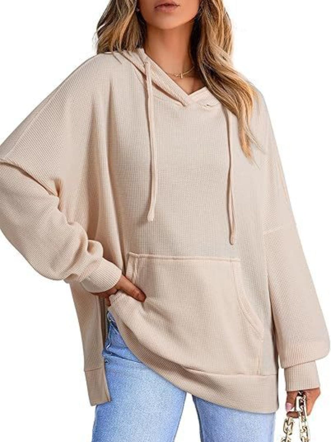 Sleek pocketed hoodie with drawstring and side slit