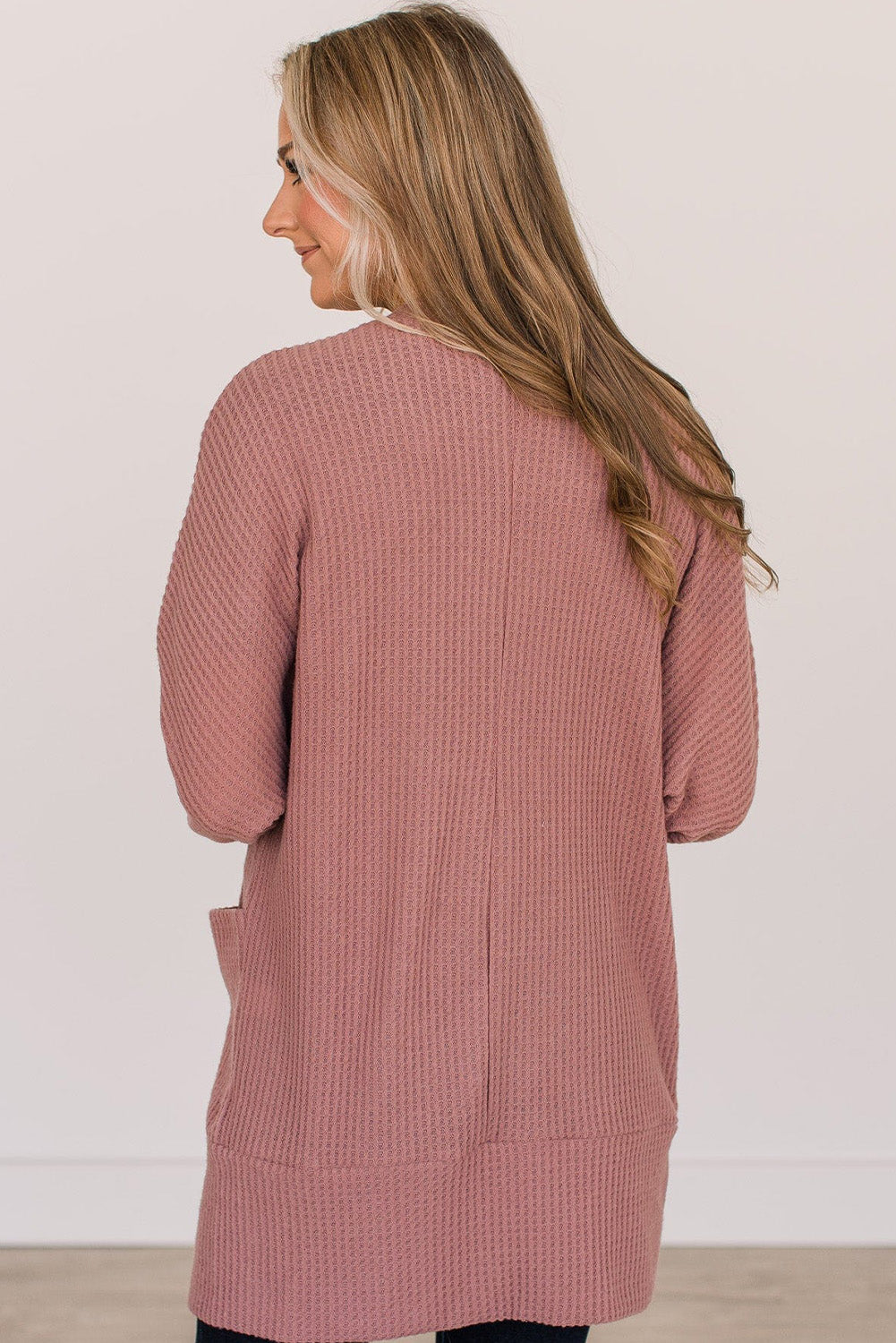 Cozy mineral red waffle knit cardigan with pocket detail