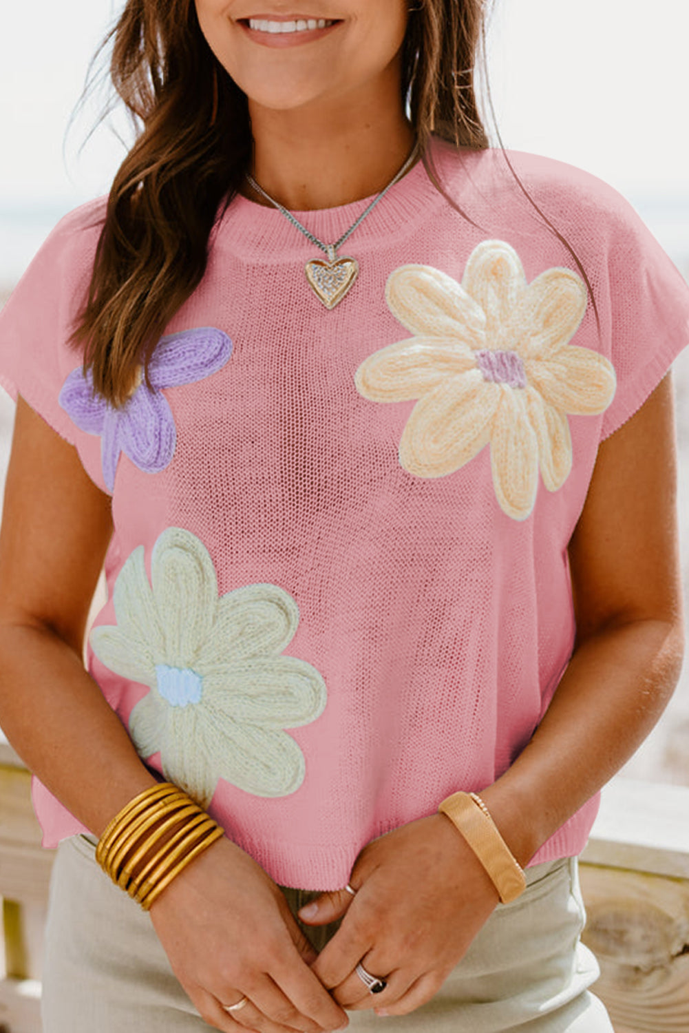 Pink multi crochet flower knit short sleeve sweater top with handmade floral details.