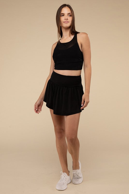 Wide band tennis skirt with pocket