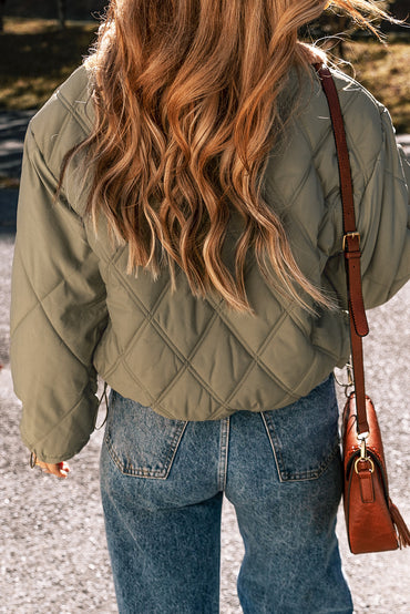 Cozy jungle green quilted puffer jacket with teddy collar and flap pockets