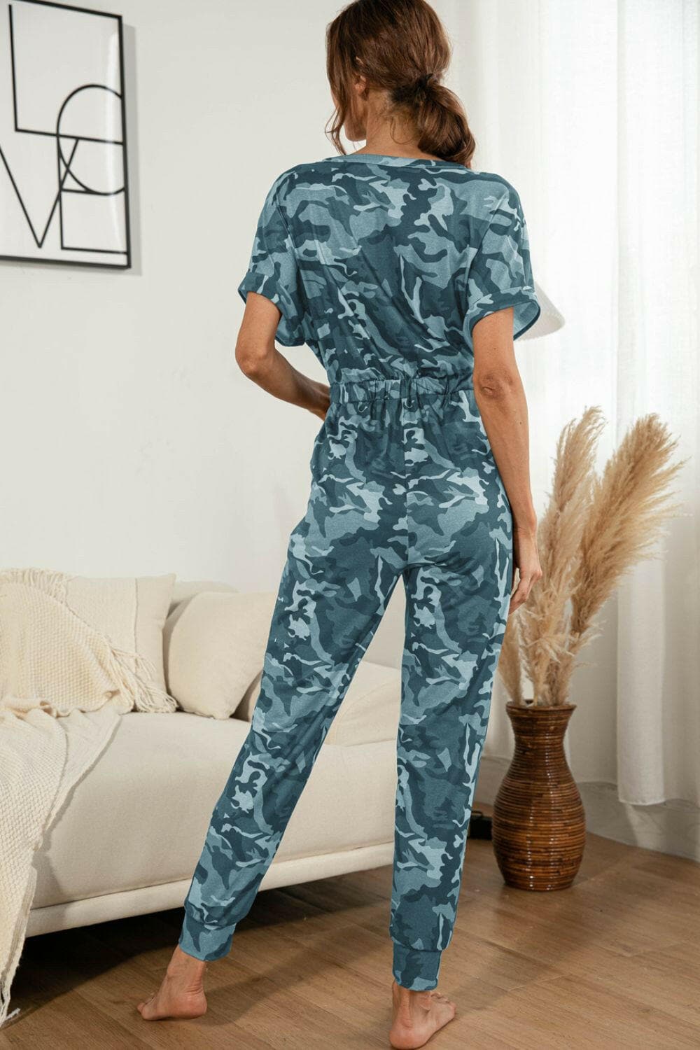 Surplice Neck Tied Short Sleeve Jumpsuit.