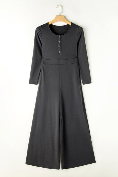 Pocketed Long Sleeve Wide Leg Jumpsuit.