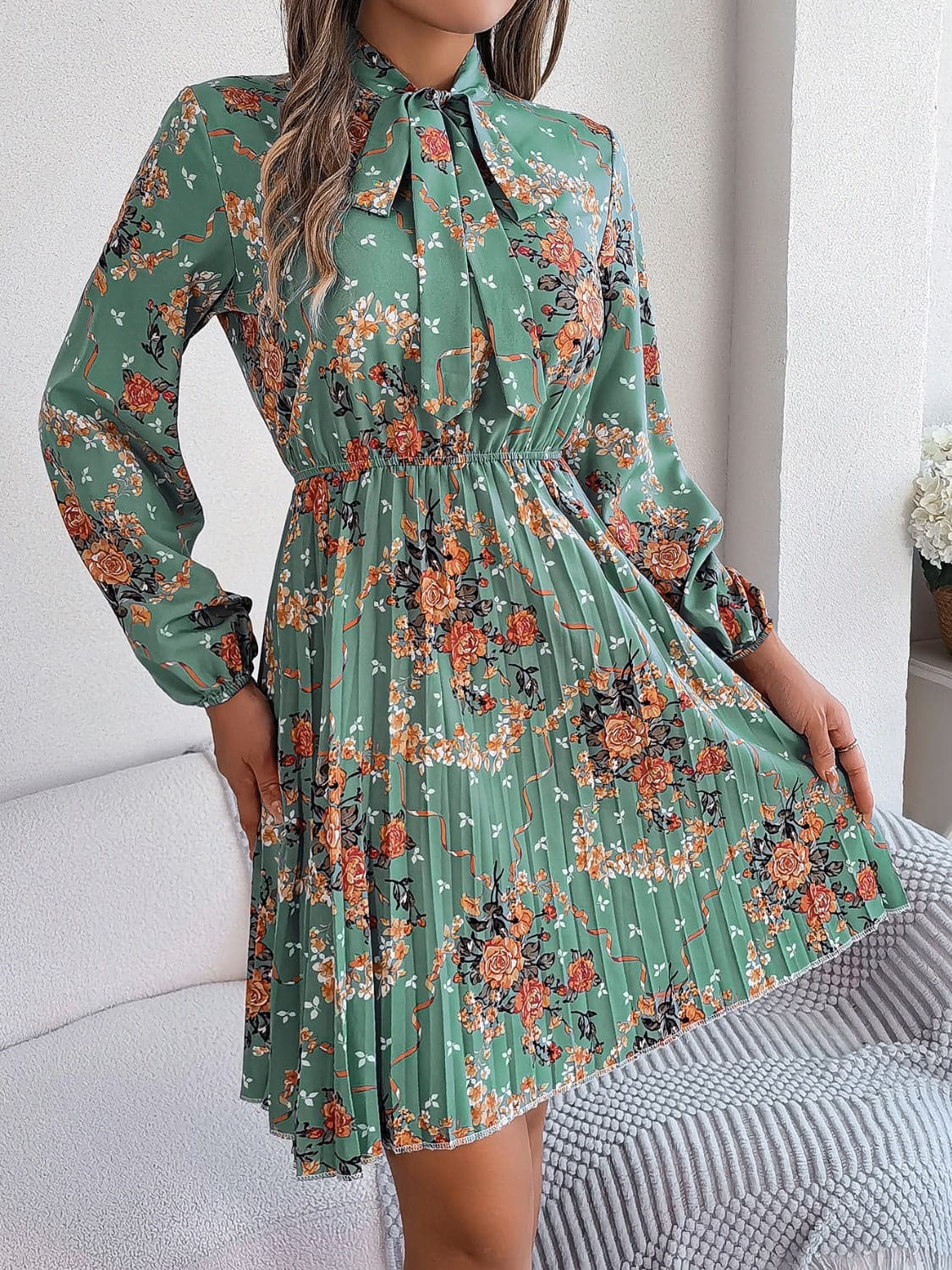 Pleated Printed Tie Neck Long Sleeve Dress.