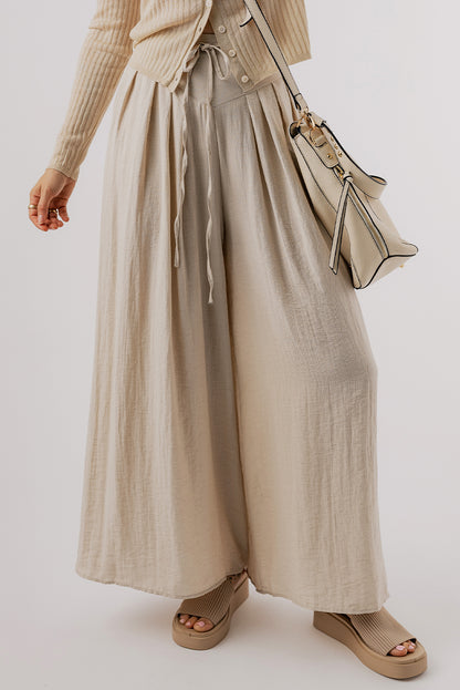 Beige high-waisted wide-leg trousers