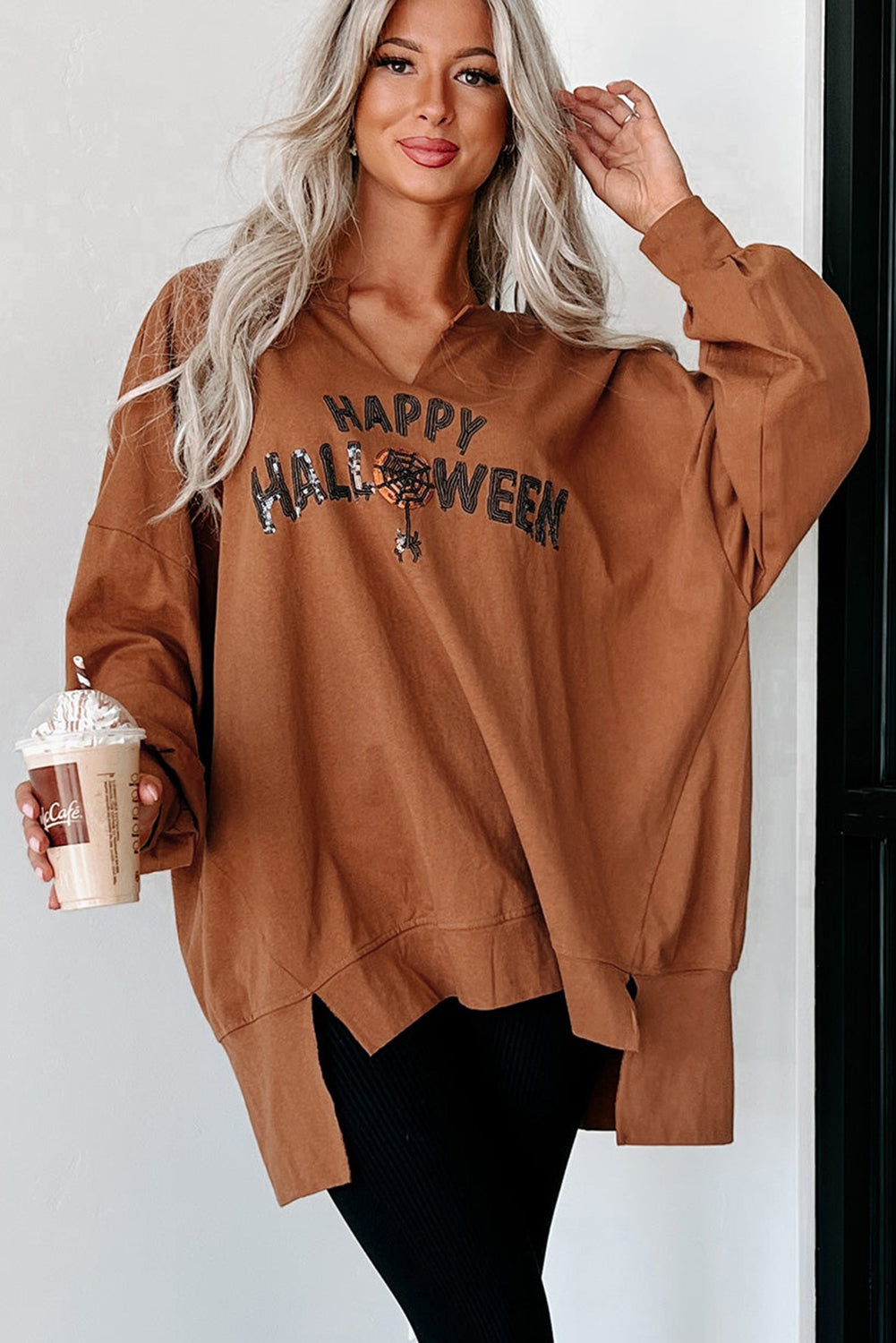 Chic chestnut Halloween top with sequin graphic and long sleeves