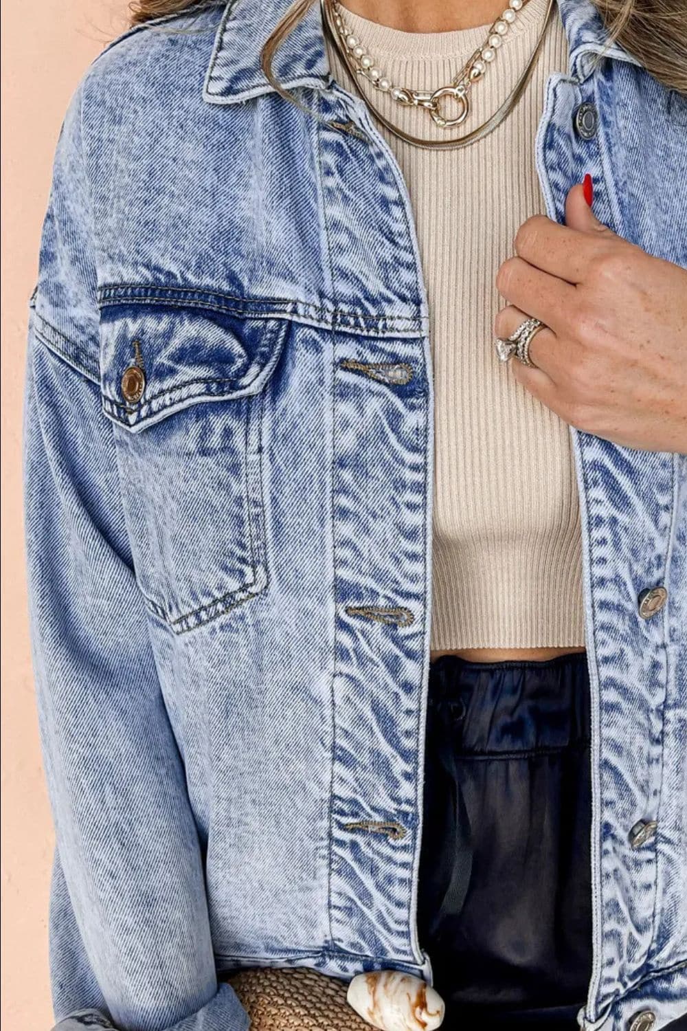 Pocketed Button Up Dropped Shoulder Denim Jacket.