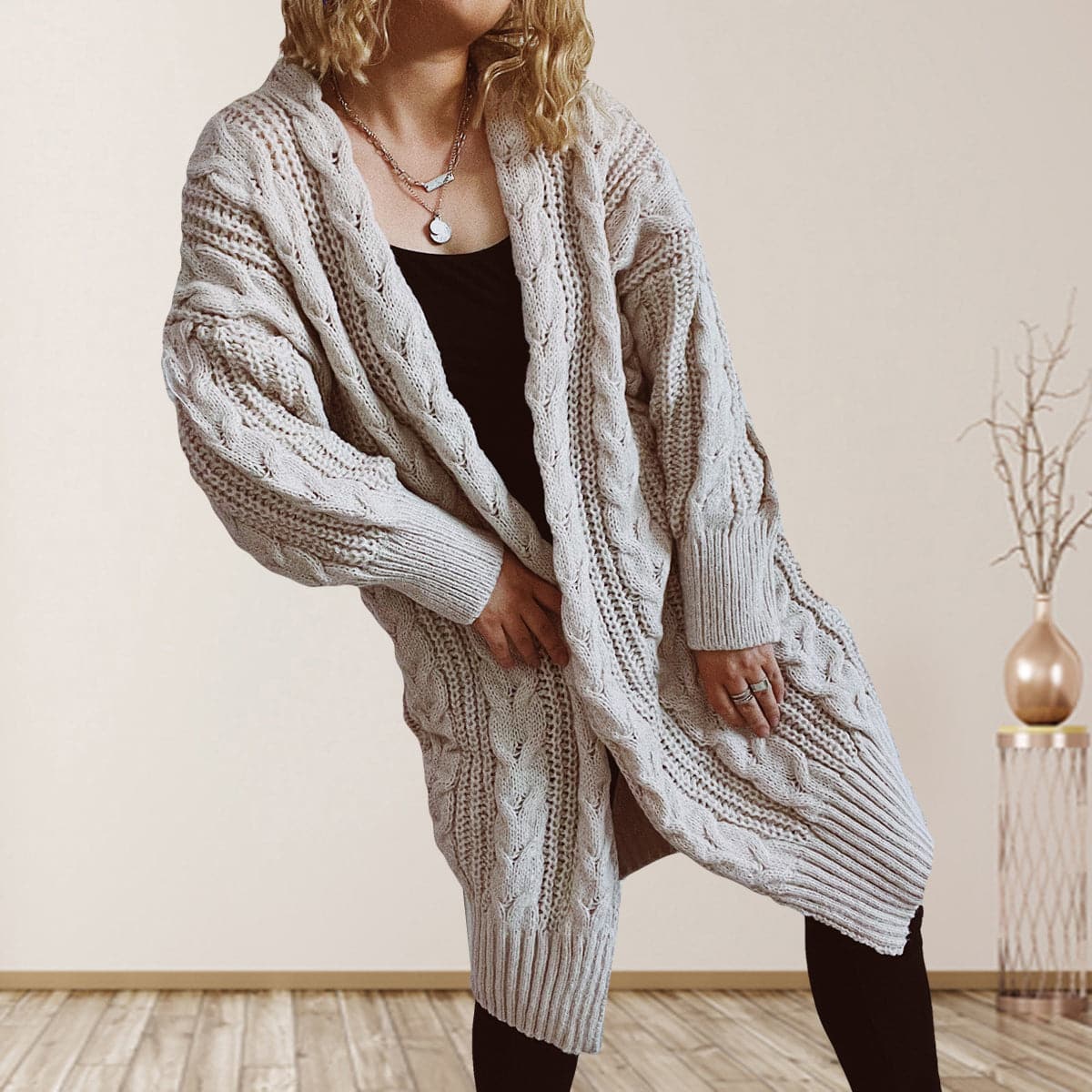 Cable-Knit Open Front Dropped Shoulder Cardigan.