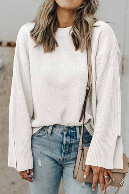 Chic textured long sleeve sweater with stylish slit detail