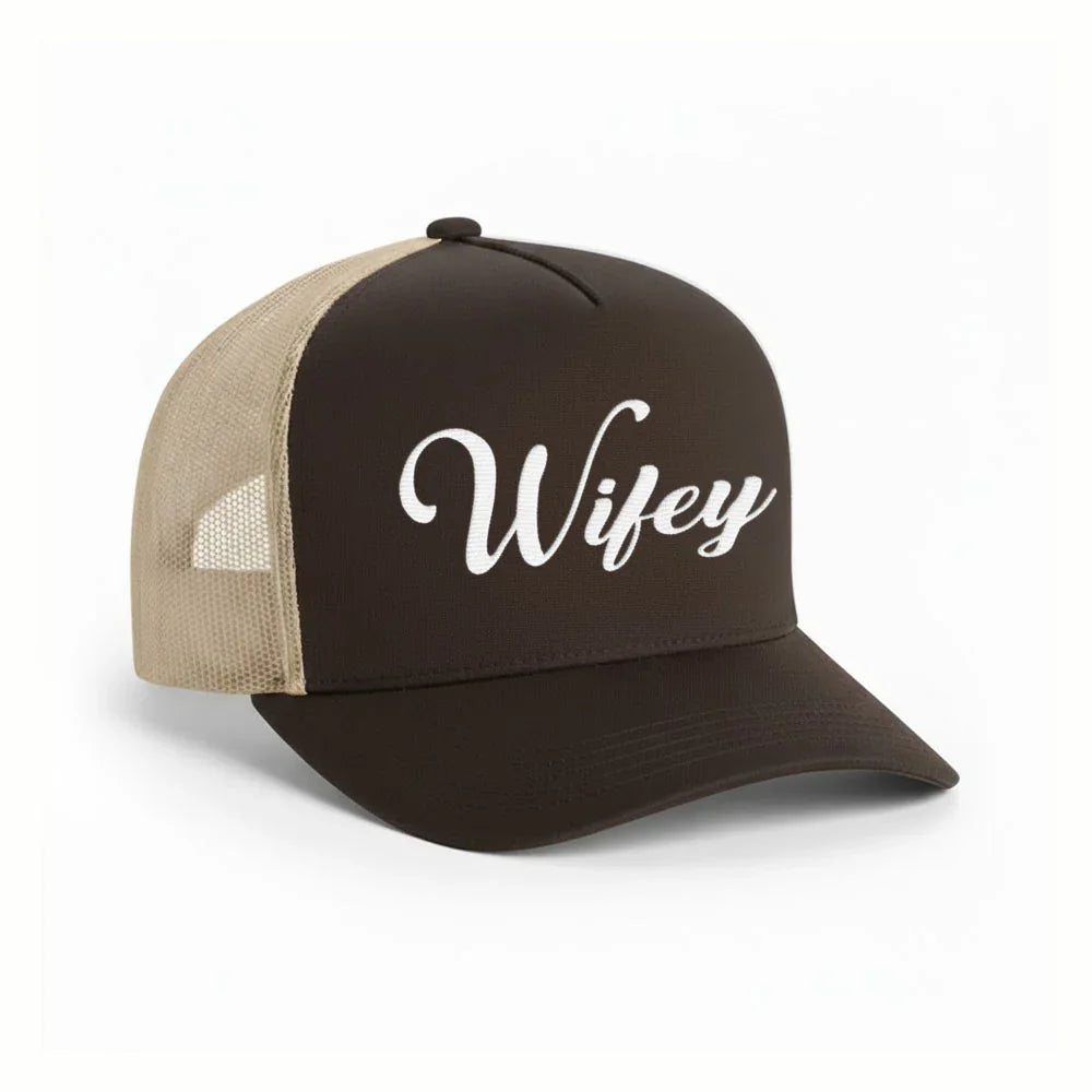 The Adorb.co Wifey trucker hat shown with casual accessories, illustrating its versatile style for any bride.