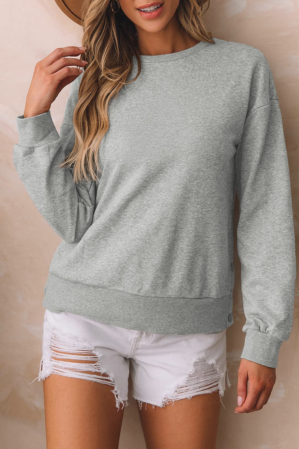 Round Neck Dropped Shoulder Sweatshirt.