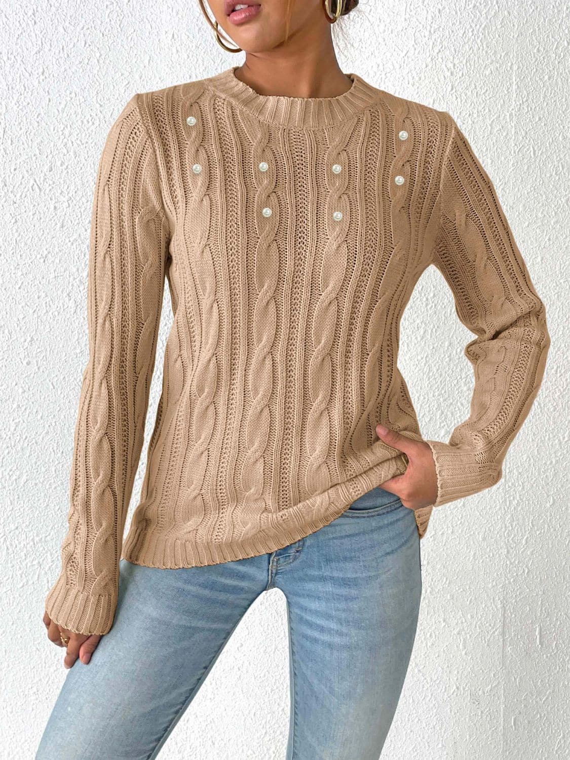 Cozy cable-knit long sleeve sweater with round neckline