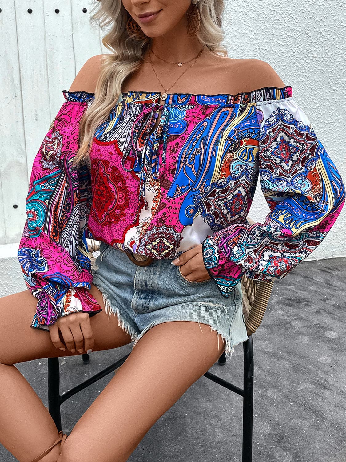 Tied Ruffled Printed Off-Shoulder Long Sleeve Blouse.